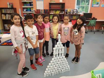Kids with their Paper Cup Towers