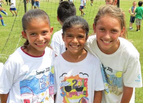 Three girls smiling 