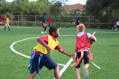 Boys playing flag football 