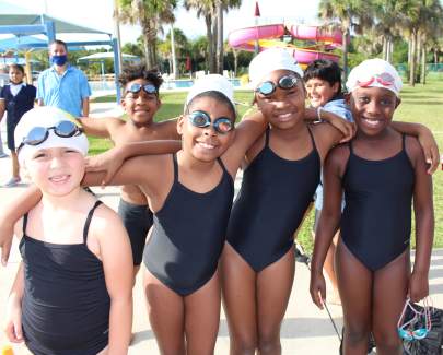 Four girls at swim practice 